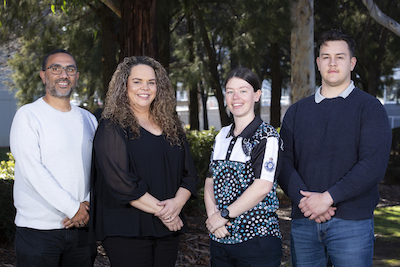 This is a photo of ACT Policing’s four First Nations Liaison Officers gathered at the Winchester Police Centre.